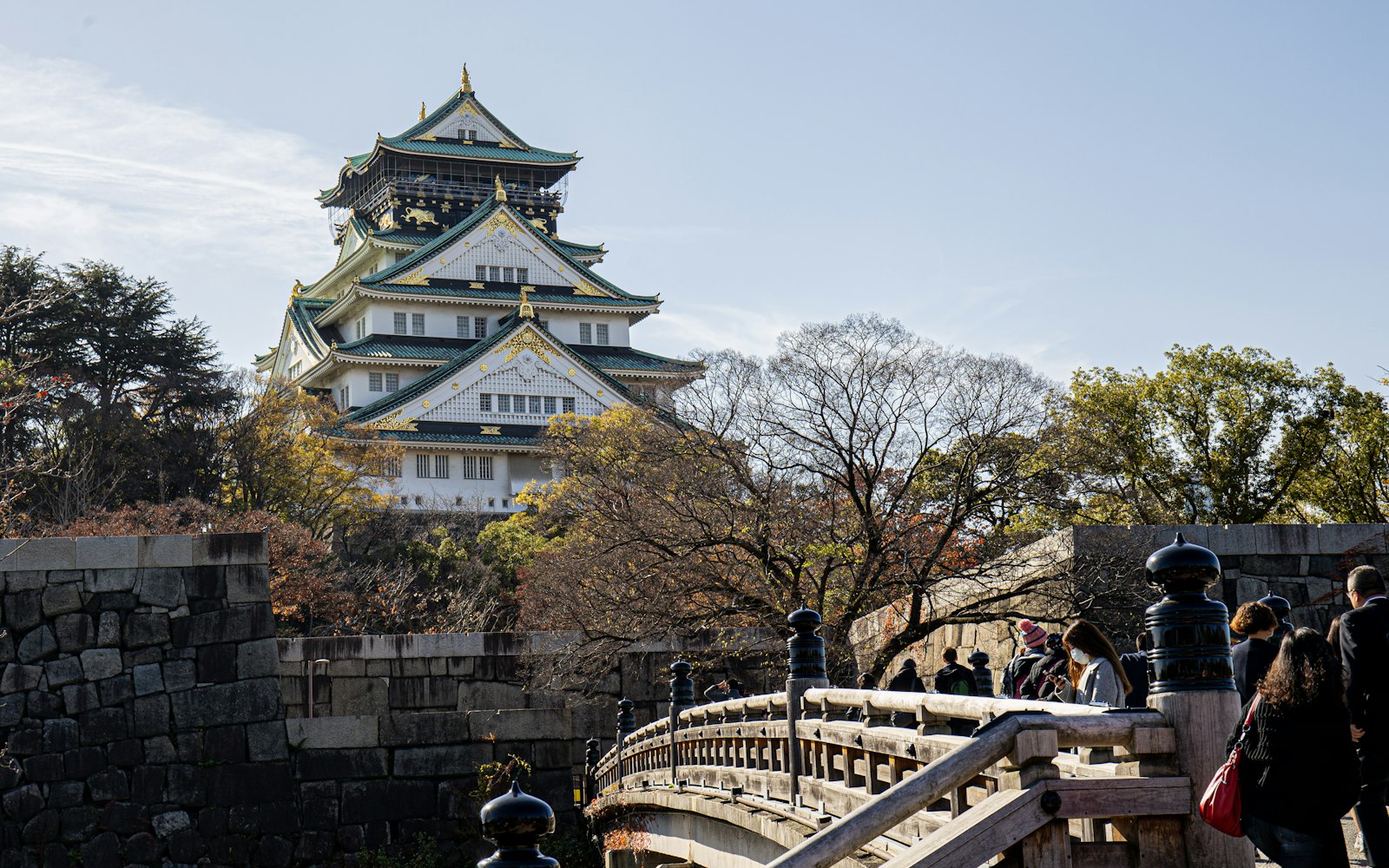 Osaka Castle above its stone walls and moat